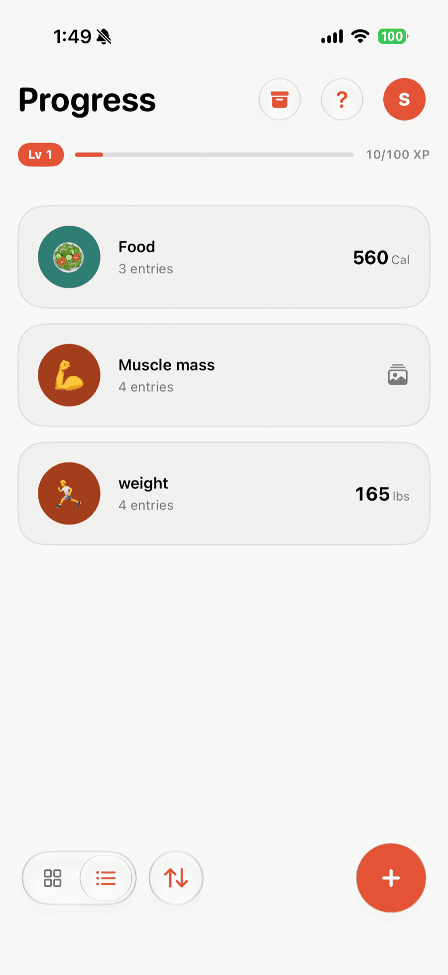 Progress Cam home screen showing tracker cards and streak XP